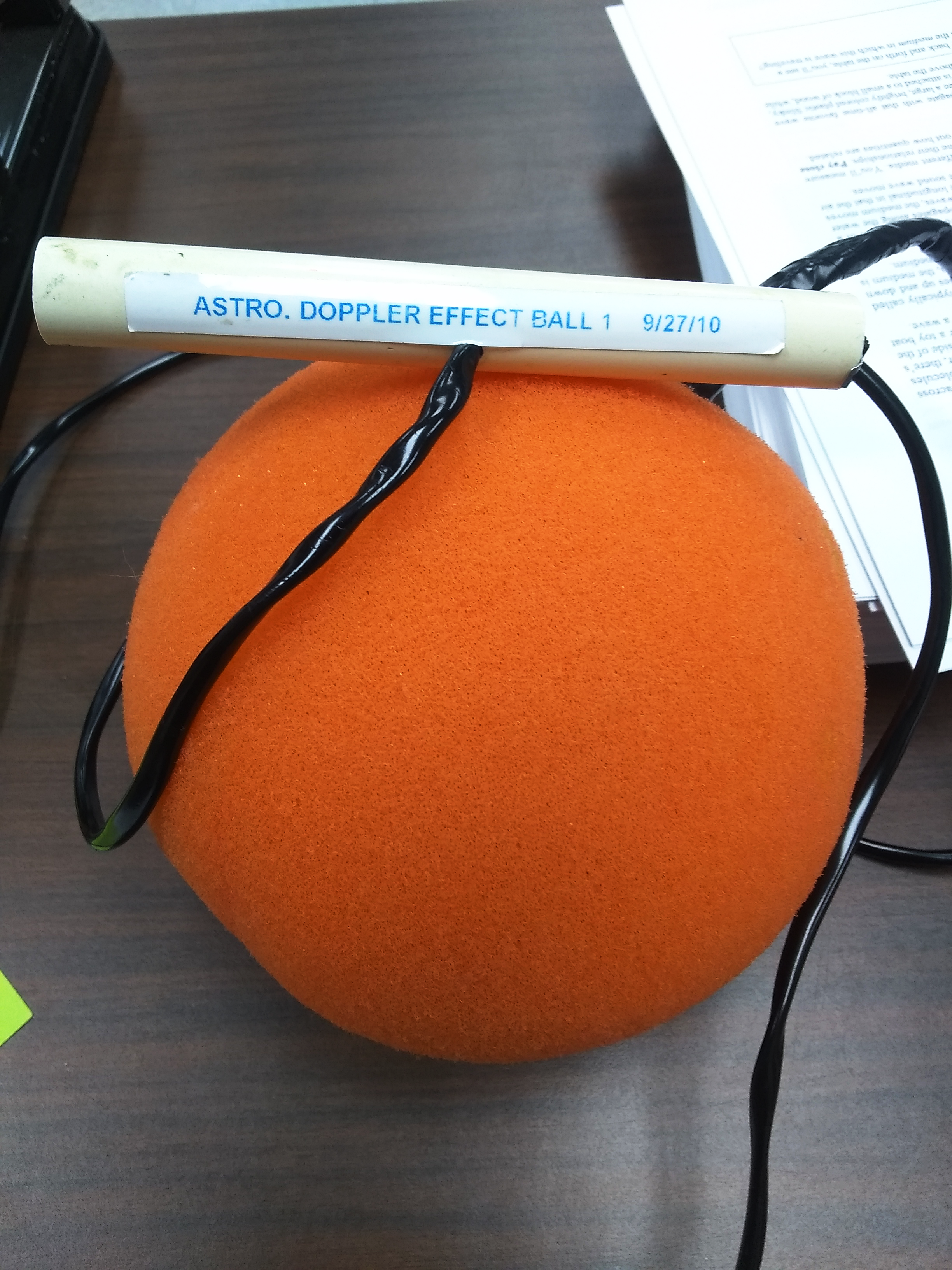 Orange foam ball on cable