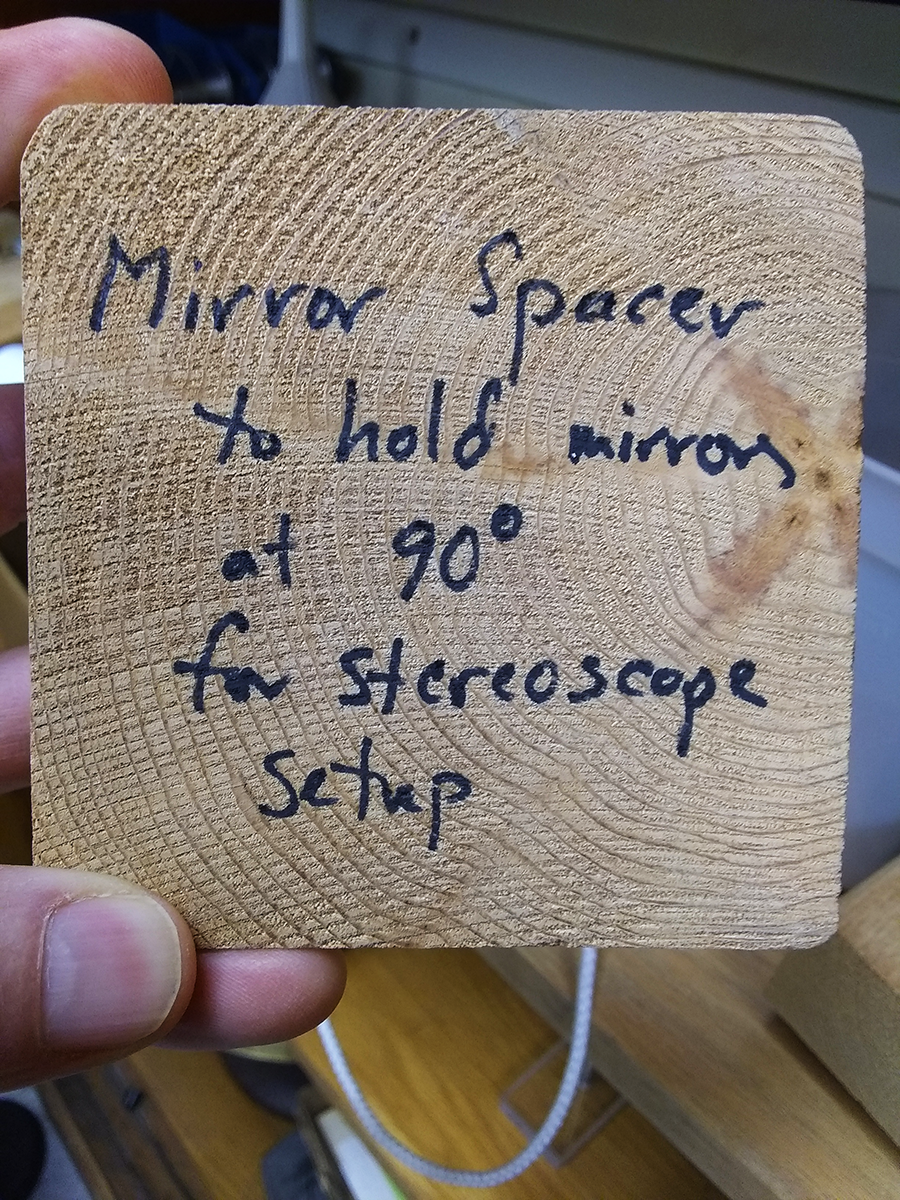 Wood block with text: Mirror Spacer to hold mirrors at 90d for stereoscope setup