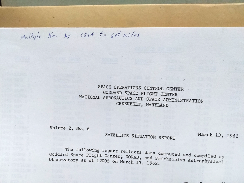 NASA data with hand-written kilometers to miles conversion