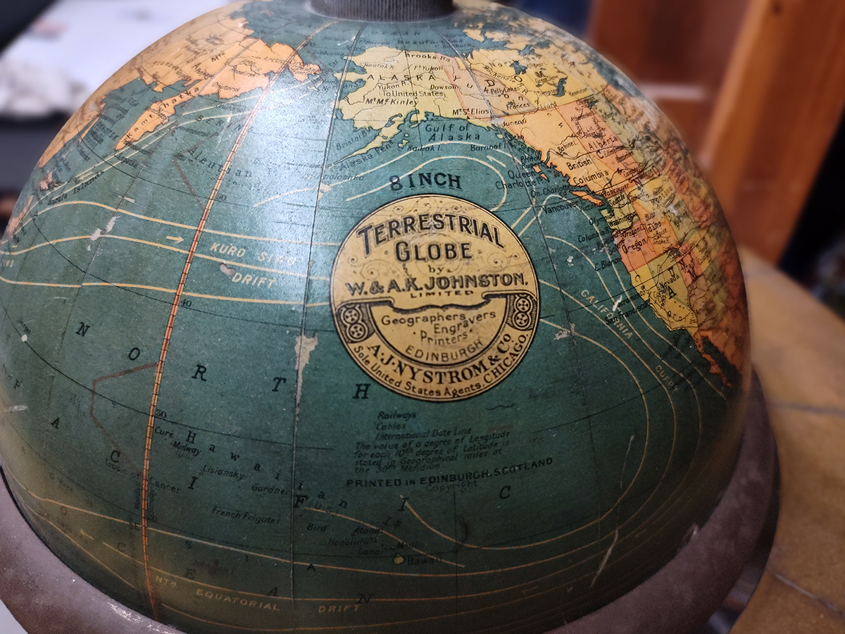 8 inch terrestrial globe by W & AK Johnston of Edinburgh