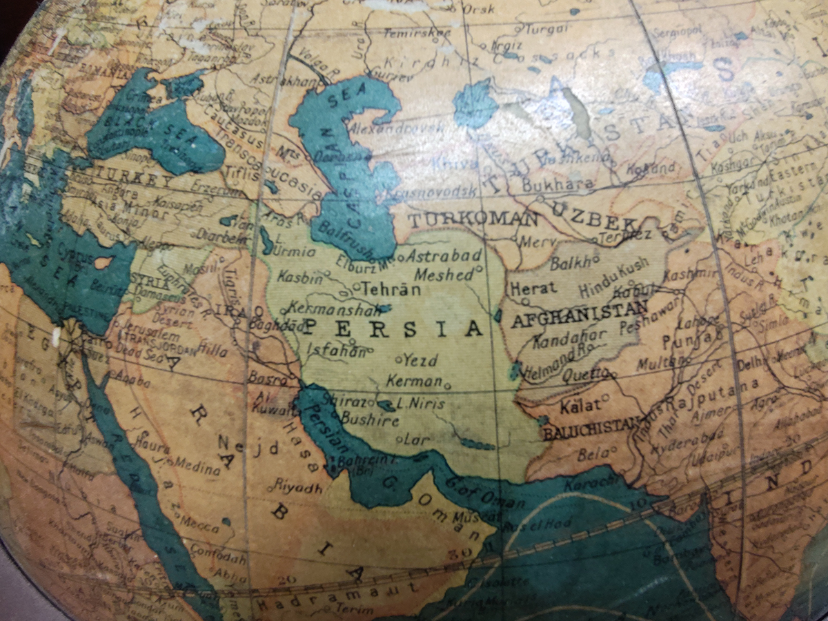 Globe showing Arabia, Persia, Transjordan.