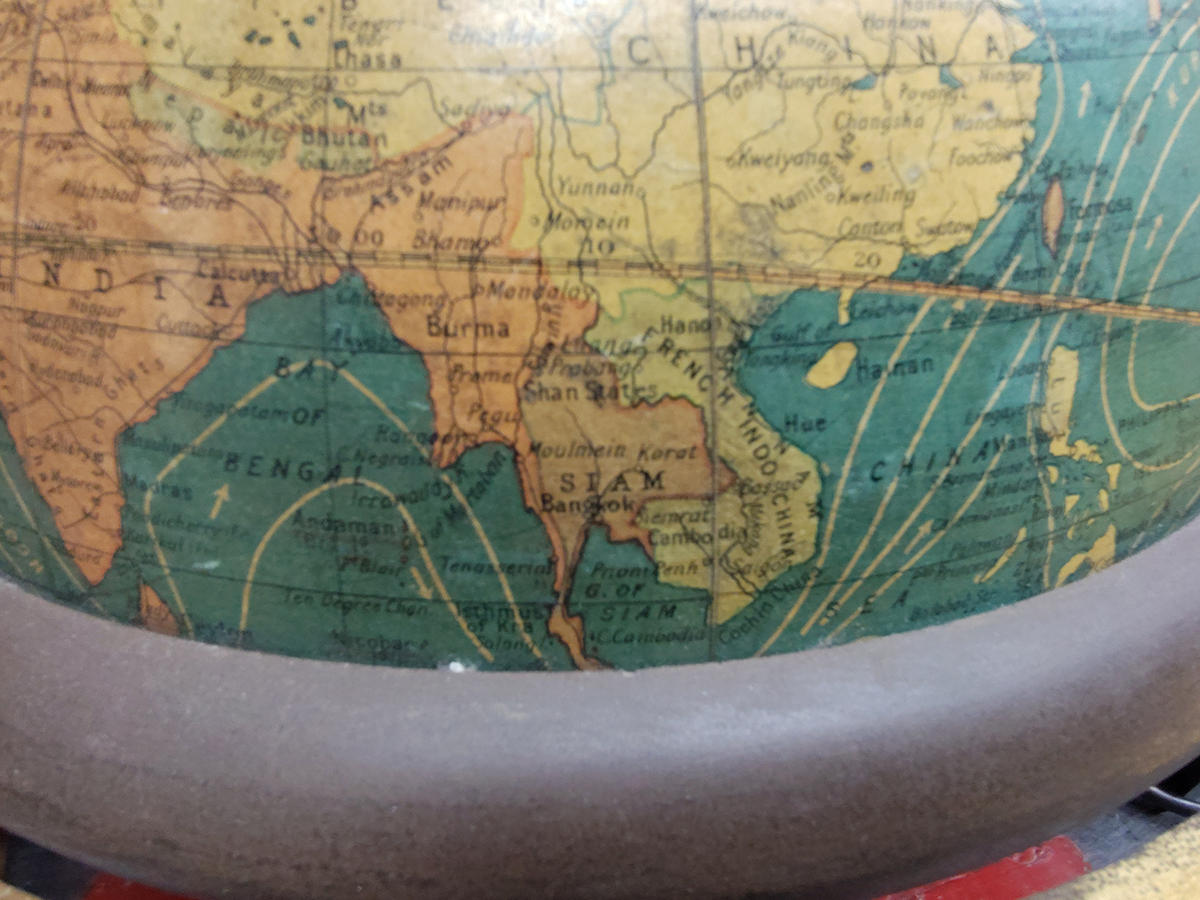 Globe showing French Indochina and Siam.