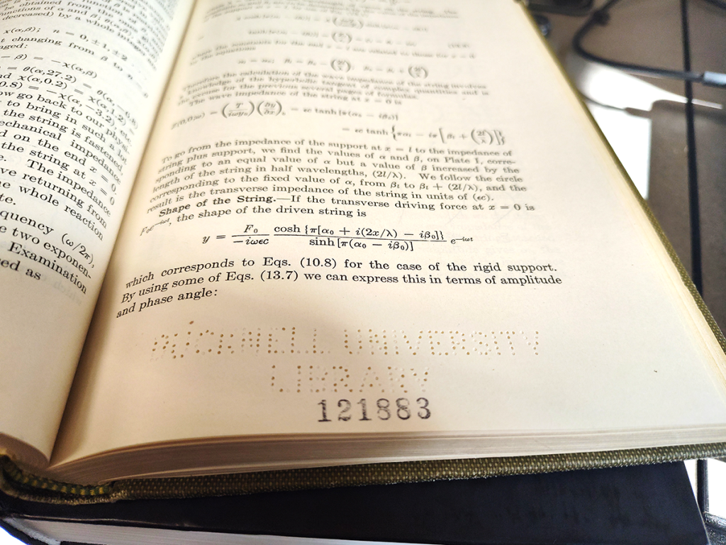 Perforation in library book page reads "Bucknell University Library"