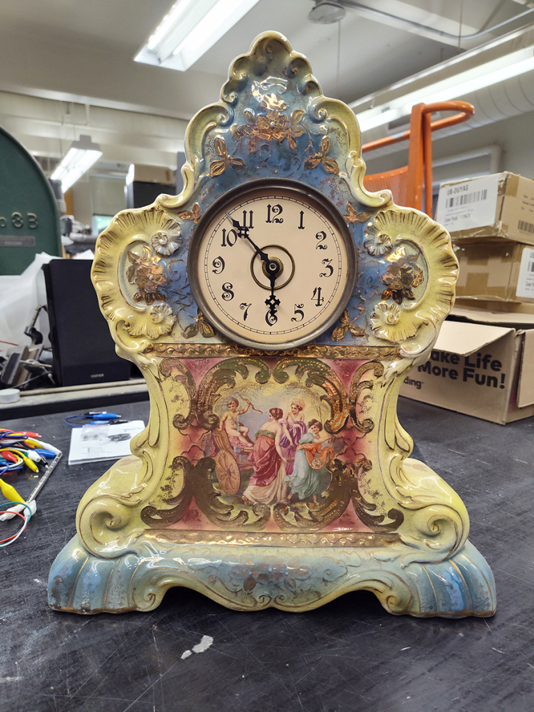 A hideous old table clock.