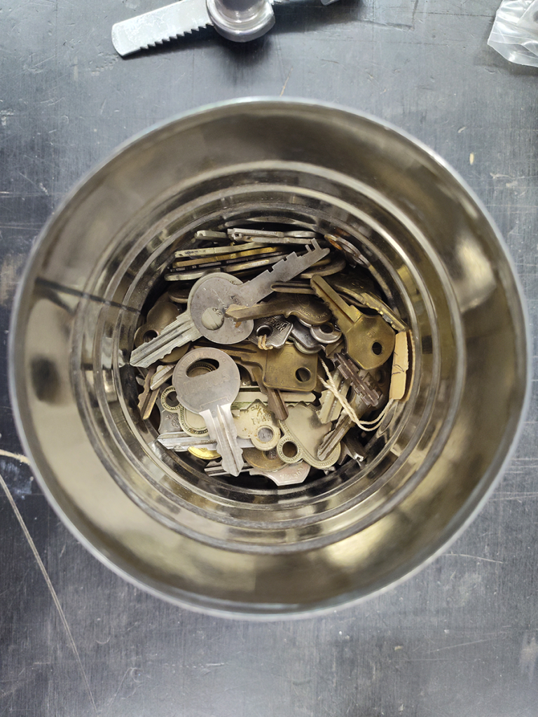 Coffee can full of old keys.