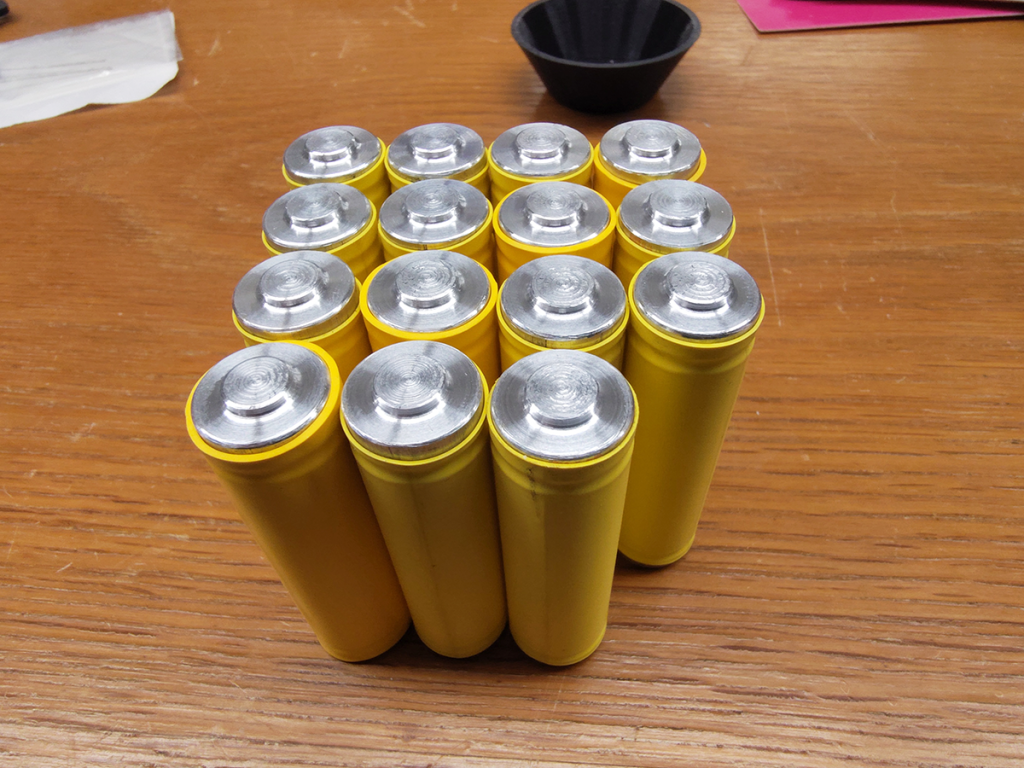 Fake battery spacers.