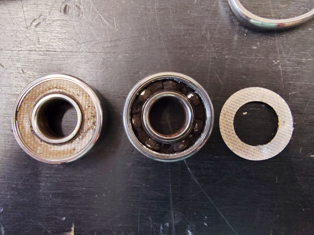 Siezed bearings, all filled with fine, dark gunk inside.
