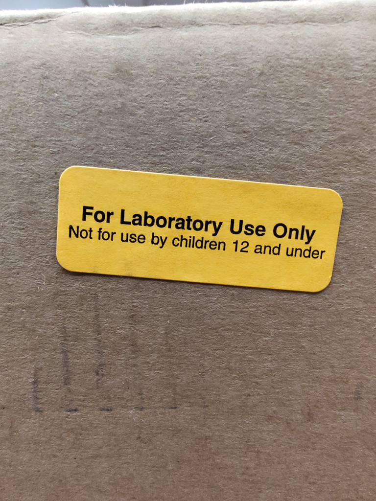 Sticker reading "For Laboratory Use Only / Not for use by children 12 and under"